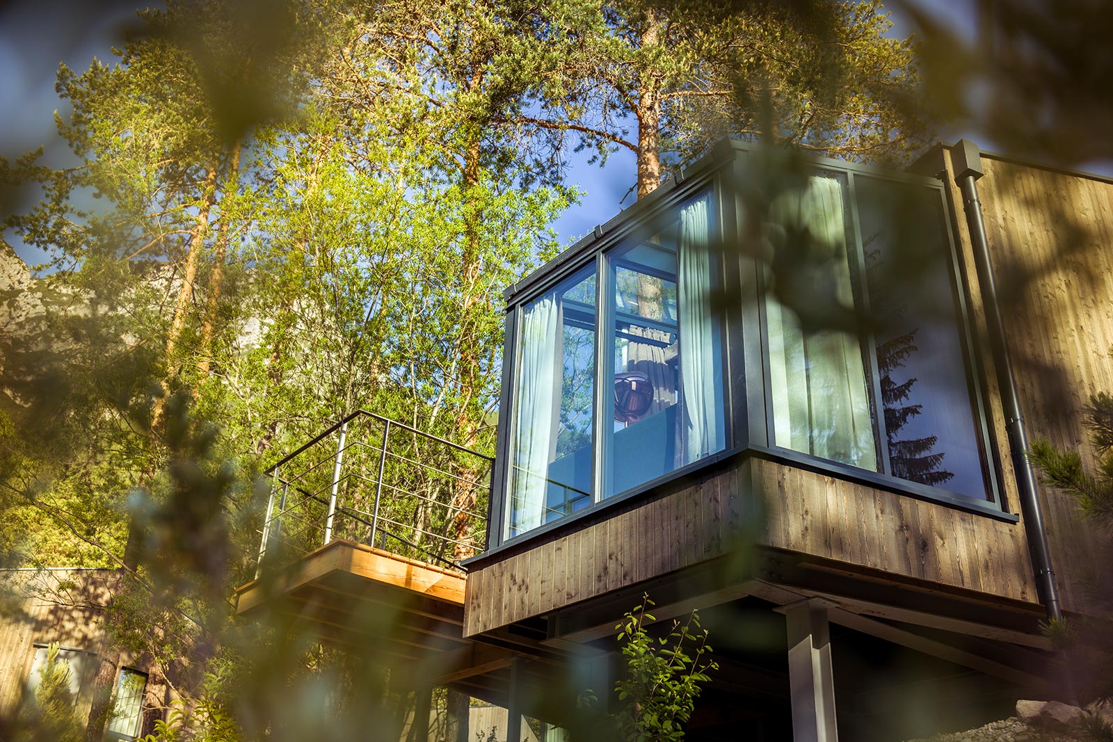 View from below - SkyView Chalet in summer • SkyView Chalets Toblacher See